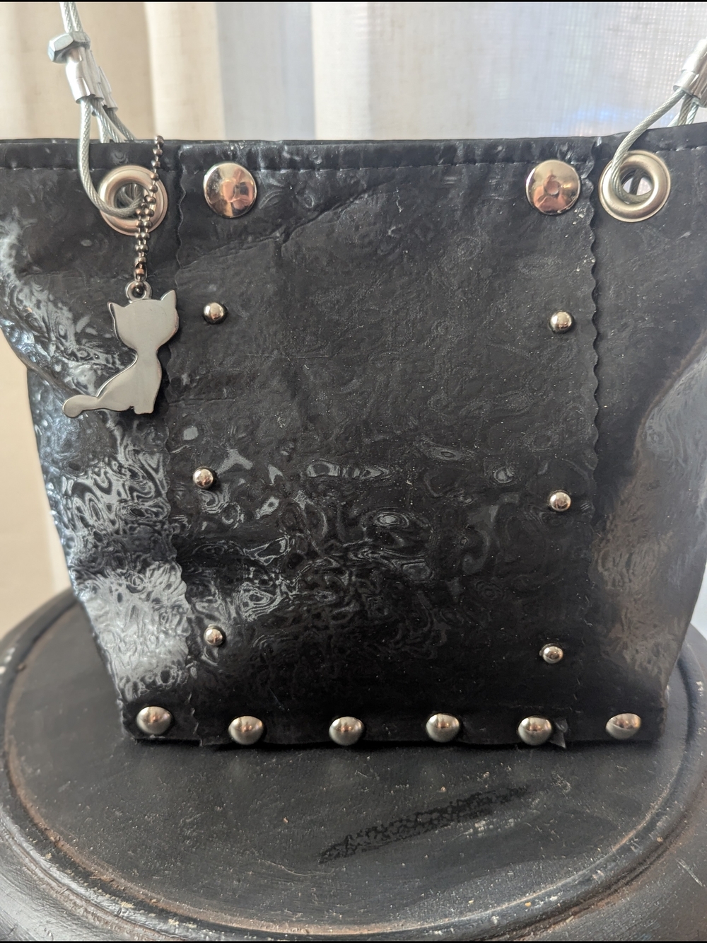 Hardwear by Renee Black Runway Tote Bag featuring a textured finish, silver stud